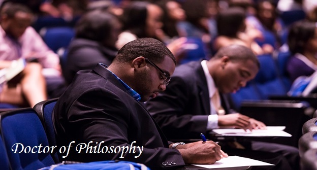 Students taking notes during a class